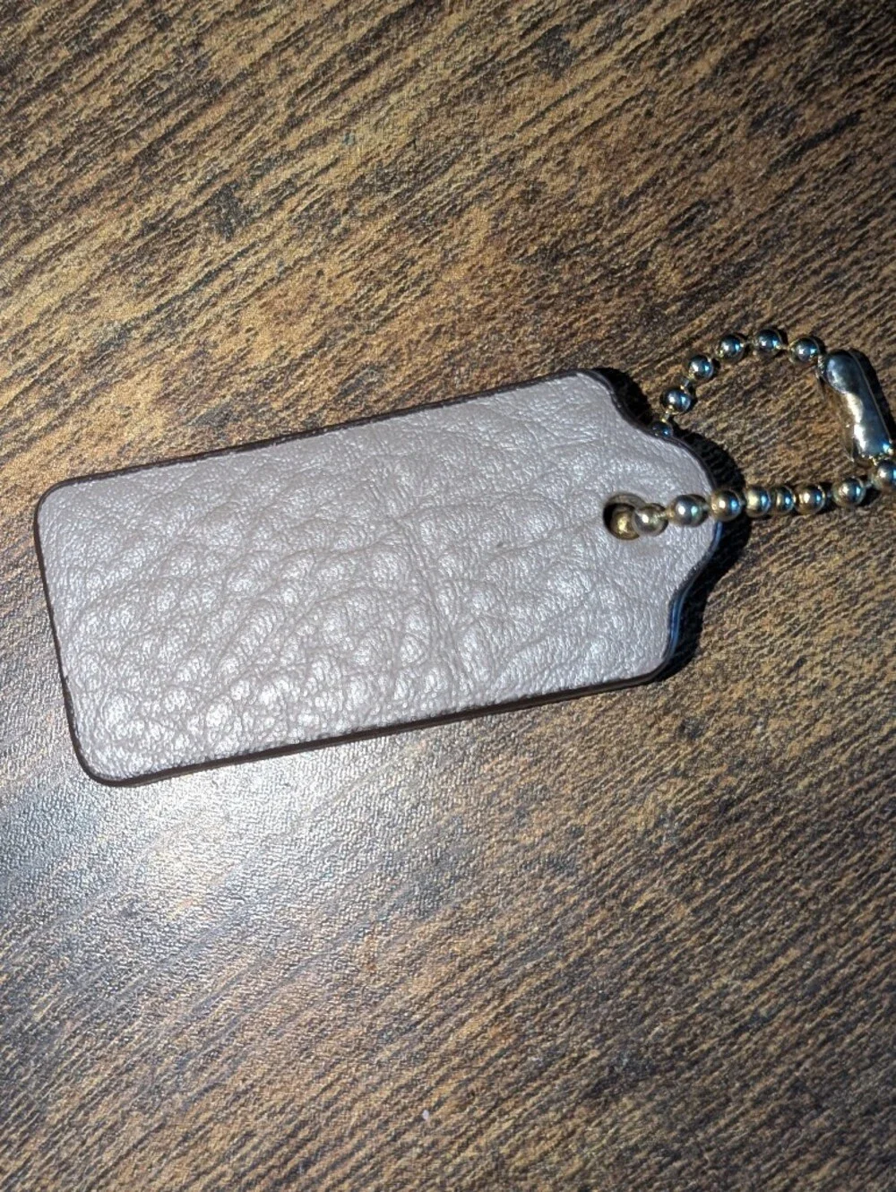 Coach leather tag
